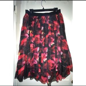 100% POLYESTER skirt.